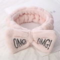 Pink plush spa headband with a large bow and black OMG! embroidery detail - Sub-pink