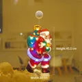 Luminous Santa Claus window suction light with LED warm white glow, 45.5x24cm size - Large Santa Delivering Gifts