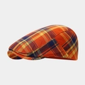 Side view of retro plaid flat cap in orange and blue cotton blend textured fabric - One Size / Orange