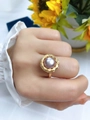 Minimalistischer Goldring mit rosa-violetter Süßwasserperle und gedrehtem Design - 8-9MM / Lila