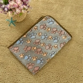 Grey flannel pet blanket with colorful paw prints and soft brown ribbon edging - Dark Brown Paw Print