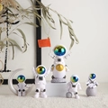 Set di cinque statuette di astronauti in resina con dettagli dorati per decoro scrivania - (Versione Razzo) Set da 5 Pezzi Sfumato