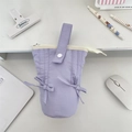 Detailed macro view of light purple quilted cotton bag with bow drawstring and snap button - Light Purple
