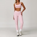 Women's two-piece pink yoga set with V-cross high waist leggings and sports bra - S / Top And Bottom / Sports Bra + Leggings / Peach Pink