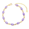 Golden Evil Eye bracelet featuring purple enamel eyes and sparkling white crystals - Purple