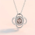 Silver four-leaf clover projection necklace with central brown stone and crystals - Clover Silver