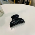 Close-up of black glossy butterfly hair claw clip with smooth finish on white surface - Approx 6.8cm / Glossy Black