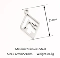 Silver stainless steel rhombus pendant with hollow mountain design and size markings - Mountain / Steel