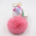 Pink fluffy pompom keychain with colorful unicorn pendant and golden hardware - Deep Pink