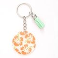 Acrylic keychain with orange floral pattern and light green tassel on silver ring - Orange Floral Pattern (20476)