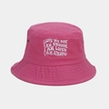 Close-up of pink bucket hat featuring white letter embroidery and metal eyelet details - One Size / Rose Red