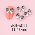 Detail view of silver bow nail art charm with grey heart rhinestone, size 11.5x8mm - Silver Base Dark Gray (AC11)