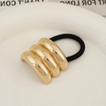 Minimalist hair tie with three-section golden metal tube and black elastic band - Triple Layer Arc KC Gold