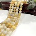 Natural tiger eye and jade round beads strand in warm yellow and soft beige tones - Huanglong Jade 29 / 6mm / Approx 63pcs