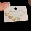 Set of six heart-shaped gold studs including crystal-encrusted and hollow designs - Gold-Rhinestone Heart Set (14#)