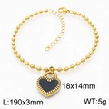 Bracciale a sfere dorate con ciondolo a cuore nero e bordo dentato su bianco - Bracciale Cuore Nero Dorato (KB167252-Z)