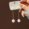 Detail of long gold chain earrings featuring double pearls and star stud accents - Creamy White Double Artificial Pearl Gold Ear Line(E1819-1)
