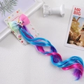 Close-up of unicorn hair clip with pink bow and colorful gradient curly synthetic hair - Rose Blue Purple