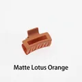 Detailed view of matte lotus orange square claw clip with hollow rectangular design - Matte Lotus Orange