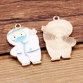 Cartoon doctor enamel medical charm with gold plating and blue and white details - Baymax Cartoon Character / Gold/White/Blue