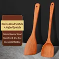 Natural wood spatula set including flat and slanted turners with visible grain texture - Slanted and Large Spatula 2-Piece Set