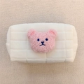 Quilted white cosmetic bag featuring a pink teddy bear embroidery and soft fabric texture - White (Pink Bear)