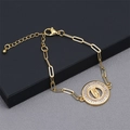 Bracelet à maillons dorés avec pendentif Vierge Marie et incrustations de zircons brillants - Chaîne Trombone Vierge Marie