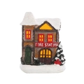 Macro detail of a resin Christmas fire station with LED light and glittery snow effect - Fire Station Style (FIRE STATION)