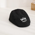 Close-up of Smile Again embroidery on a black denim beret hat with detailed texture - Kids 54cm (3-8 Years Old) / Black