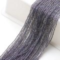 Detailed view of faceted grey-purple glass beads for DIY jewelry making and crafts - Purple String Translucent Blue