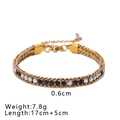 Gold stainless steel double-row bracelet with black and iridescent rhinestones - Black and Aurora Zirconia Style (NB-B1130-6)