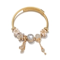 Golden steel wire bracelet with high heel and pink gift box charms for women - Gold