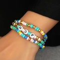 Mehrlagiges buntes Perlenarmband im Boho-Stil mit Goldakzenten und HOP-Buchstabenperlen - Buntes HOP-Buchstaben-Perlenarmband (A-303)