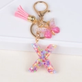 Sparkly letter X keychain with pink tassel and gradient butterfly for women bag - Letter X