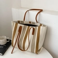 Minimalist striped large capacity tote bag with brown leather straps on white table - Brown and Khaki Stripe
