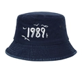 Detail of navy blue washed canvas baseball cap with 1989 embroidery and metal eyelets - Adjustable / Navy Blue
