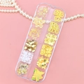 Macro view of 12-grid storage box with gold and white butterfly nail art charms - Gold Mixed Nail Art Set Style (T-343)