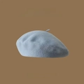 Detailed texture of light blue Australian wool beret with 2022AW seasonal branding - One Size / Light Blue