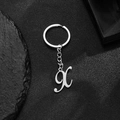 Polished silver stainless steel alphabet X pendant keychain with secure metal ring - Letter X