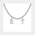 Personalized silver necklace with sparkling zircon E and T letter charms on white background - 2 Letters / Steel