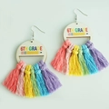 Detail of 6th Grade rainbow tassel wooden earrings with pencil design on white background - 6th Grade
