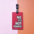 Red silicone luggage tag with white No It's Not Yours text and black buckle strap - NO IT'S NOT YOURS Slogan / Red