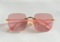 Rimless square sunglasses featuring pink lenses and golden metallic decorative hinges - Transparent Pink (Old Model)