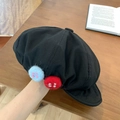 Black cotton newsboy cap featuring blue and red yarn ball buttons on the side - Button Cloud Hat - Black