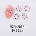 Detail of silver Christmas wreath nail charm with pink rhinestones and white pearls - Silver Pink Rhinestone Bow Wreath (AD53)