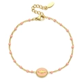 Detail view of gold stainless steel bracelet with pink beads and enamel charm - SL1793 / Pink