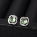 Elegant halo stud earrings with a round green gemstone and cubic zirconia in silver - Apple Green