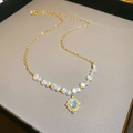 Vintage style gold necklace with irregular pearl and iridescent stone pendant - Gold Rhombus