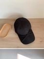 Detail shot of black quick-dry baseball cap with a stylish bow knot on the brim - One Size Adjustable (56-58cm) / Black