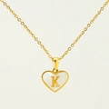 Gold heart pendant necklace with natural shell and capital letter K on white background - Letter K